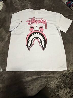 Stüssy x Shark Graphic Tee in White & Pink